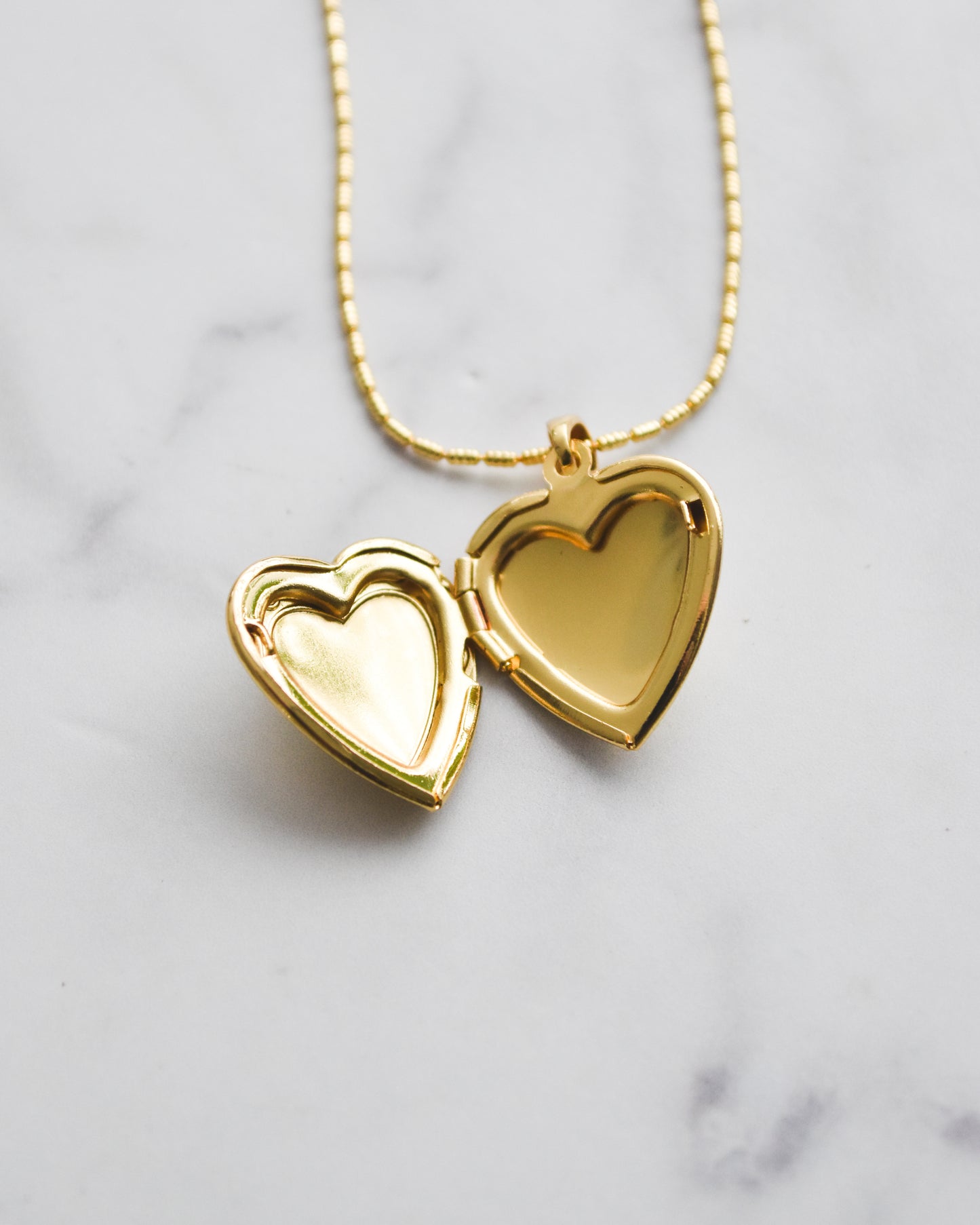 Relicario Corazón Bañado en Oro