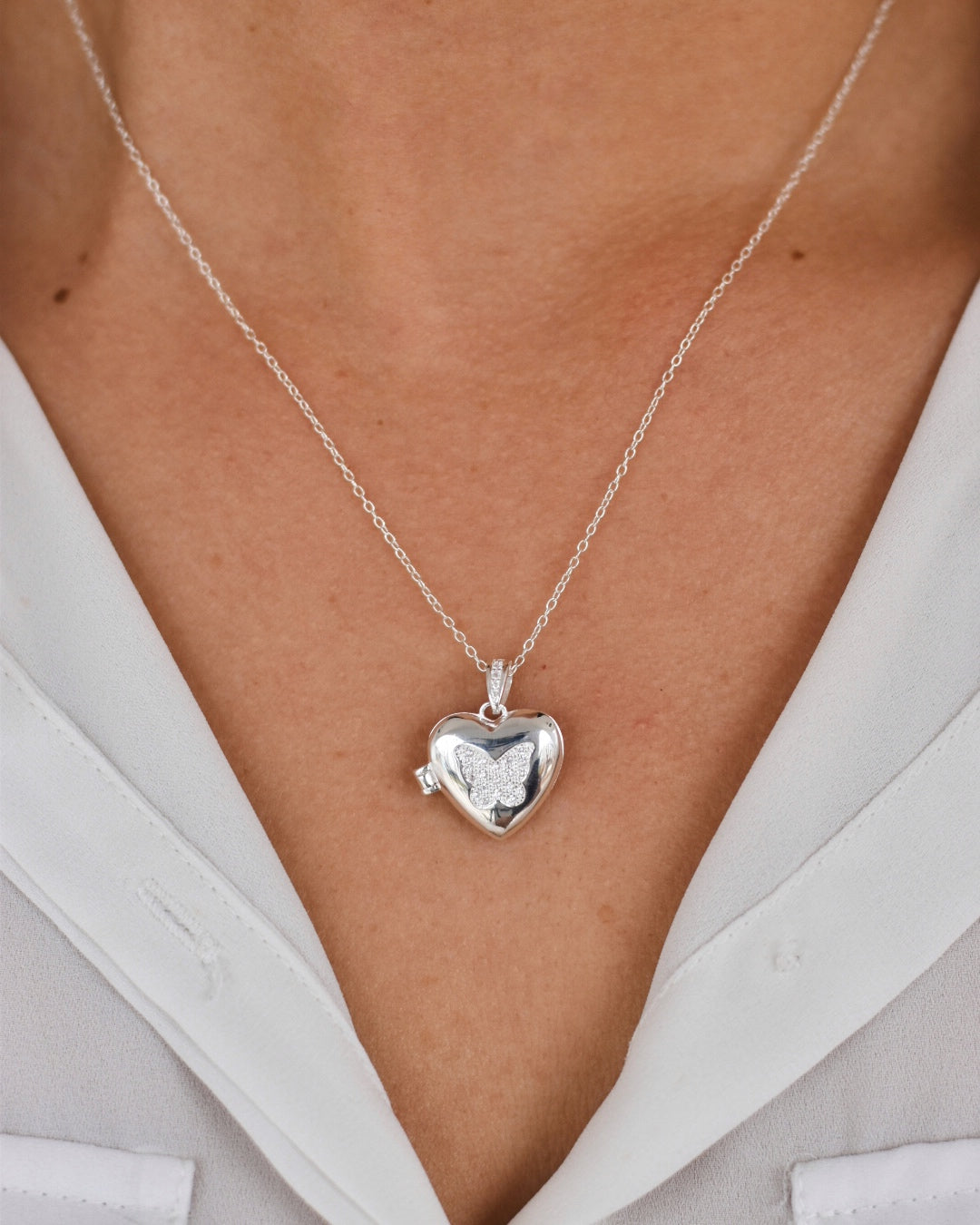 Relicario Corazón Mariposa en Plata 925 con Circones