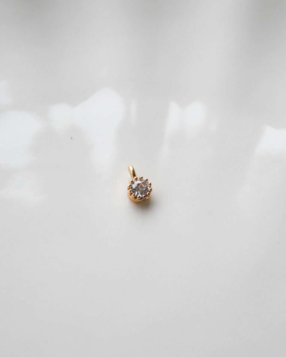 Dije de Punto de Luz de Circón Bañado en Oro