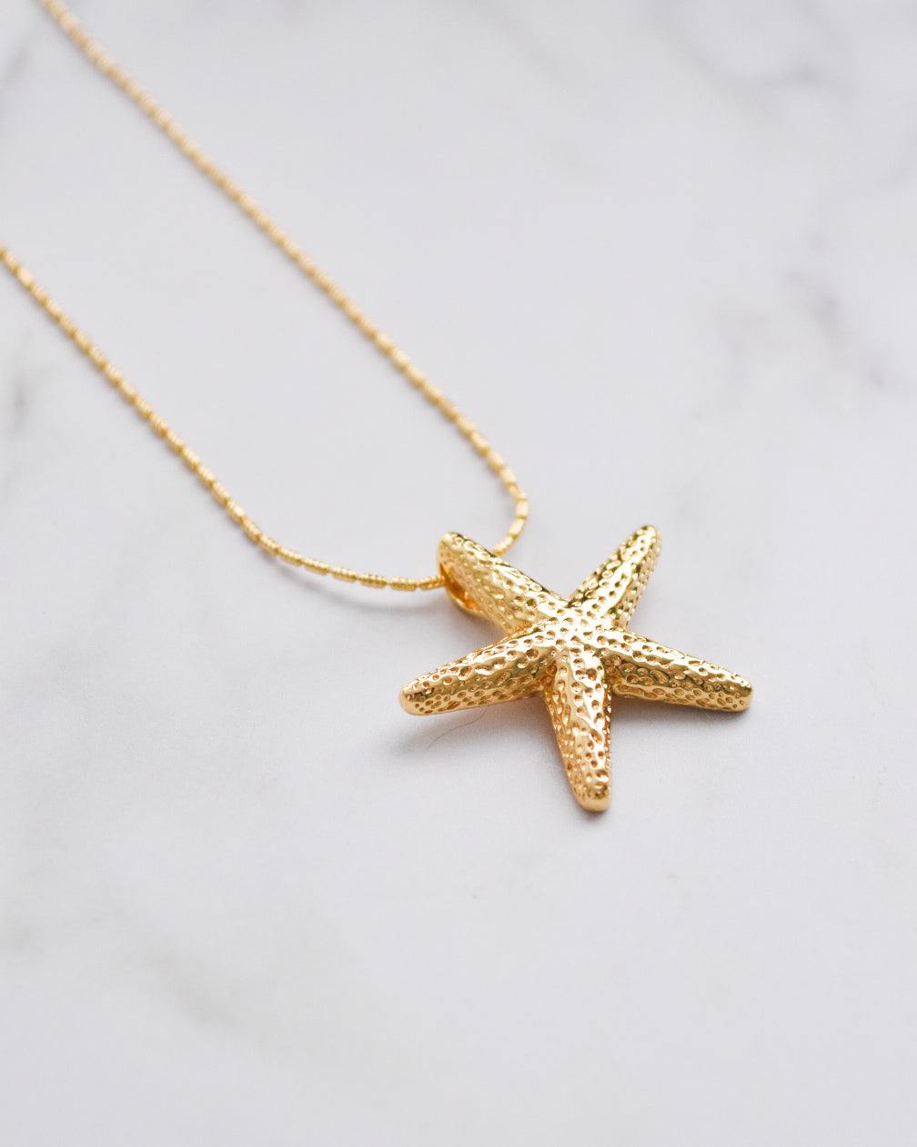 Collar Estrella de Mar Bañado en Oro