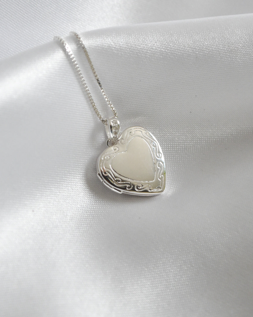 Relicario de Plata 925 “Luz Eterna” Corazón con Circones